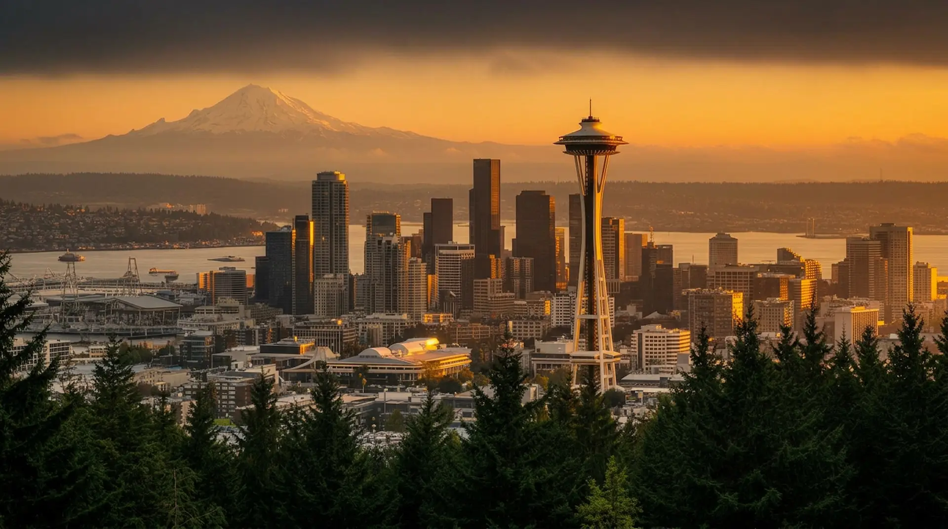 Seattle skyline with Space Needle and Mount Rainier at sunset